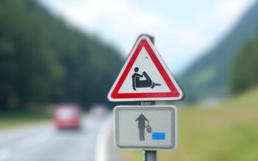 Image of a Swiss warning sign related to motorways or tolls